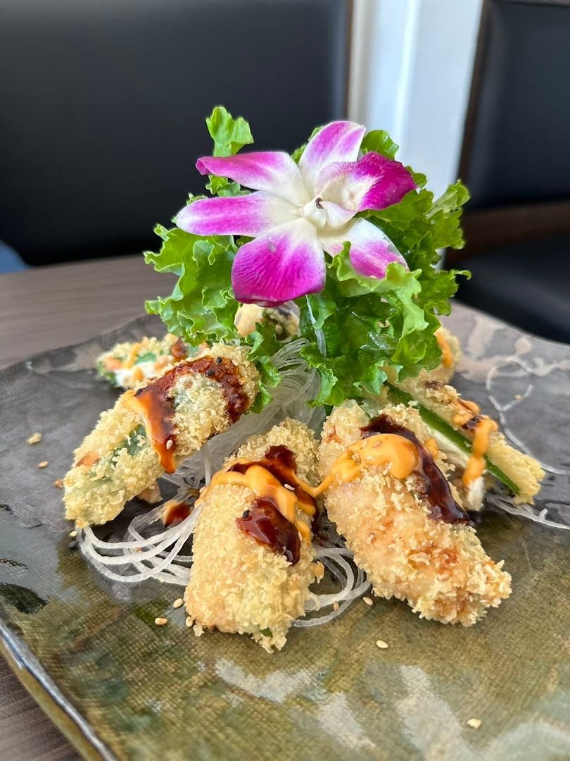 Crispy roll arranged with an orchid at Red Plum